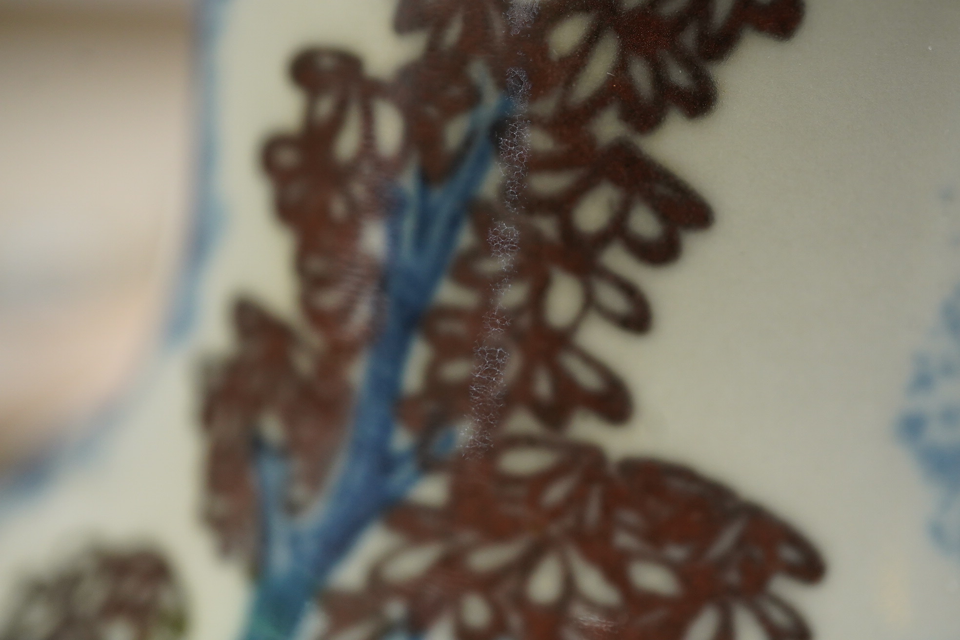 A Chinese underglaze blue and copper red ’dragon and tiger’ baluster vase, possibly 19th century